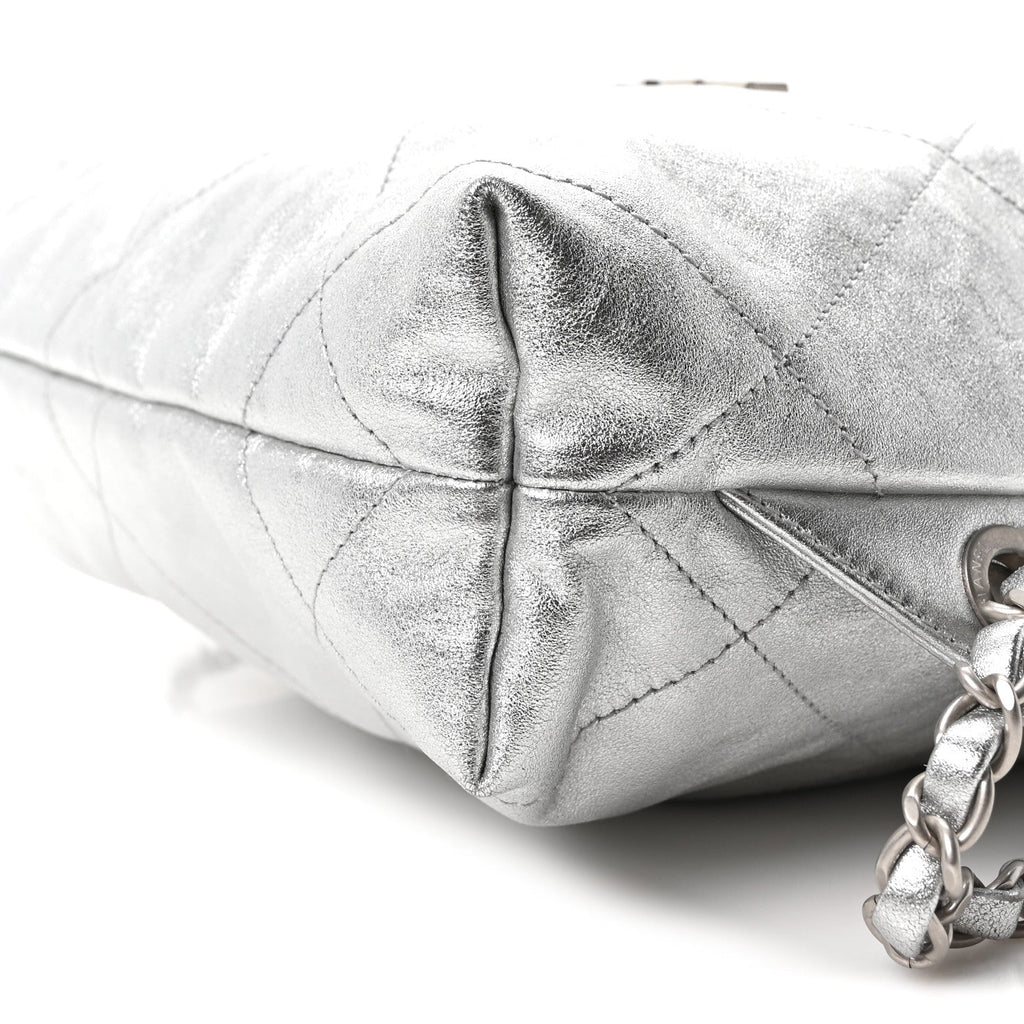 Metallic Calfskin Quilted Chanel 22 Backpack Silver