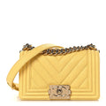 Caviar Chevron Quilted Small Boy Flap Yellow