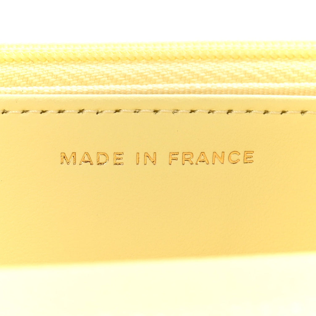 Caviar Quilted CC Turn Lock Wallet On Chain WOC Light Yellow