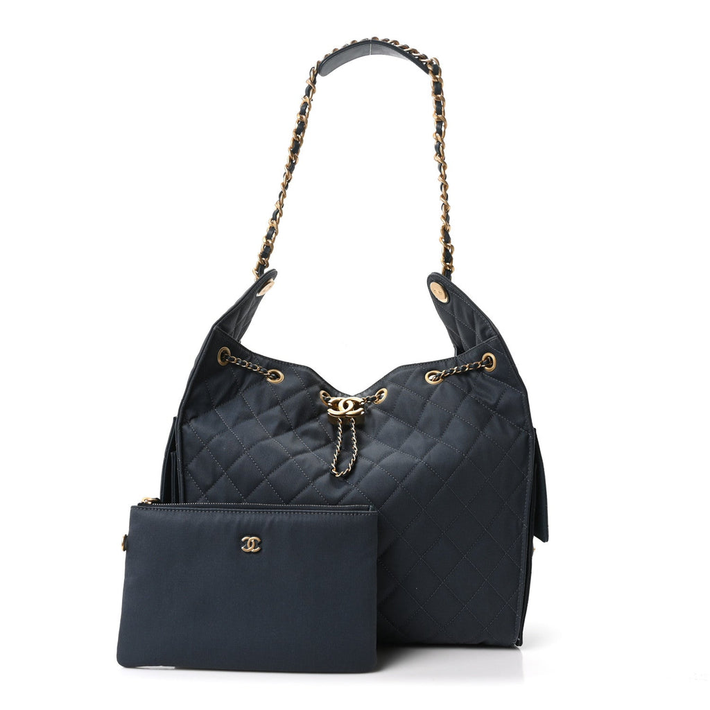 Canvas Quilted Medium Chanel 25 Handbag Dark Blue