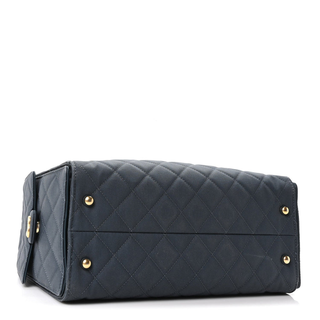 Canvas Quilted Medium Chanel 25 Handbag Dark Blue
