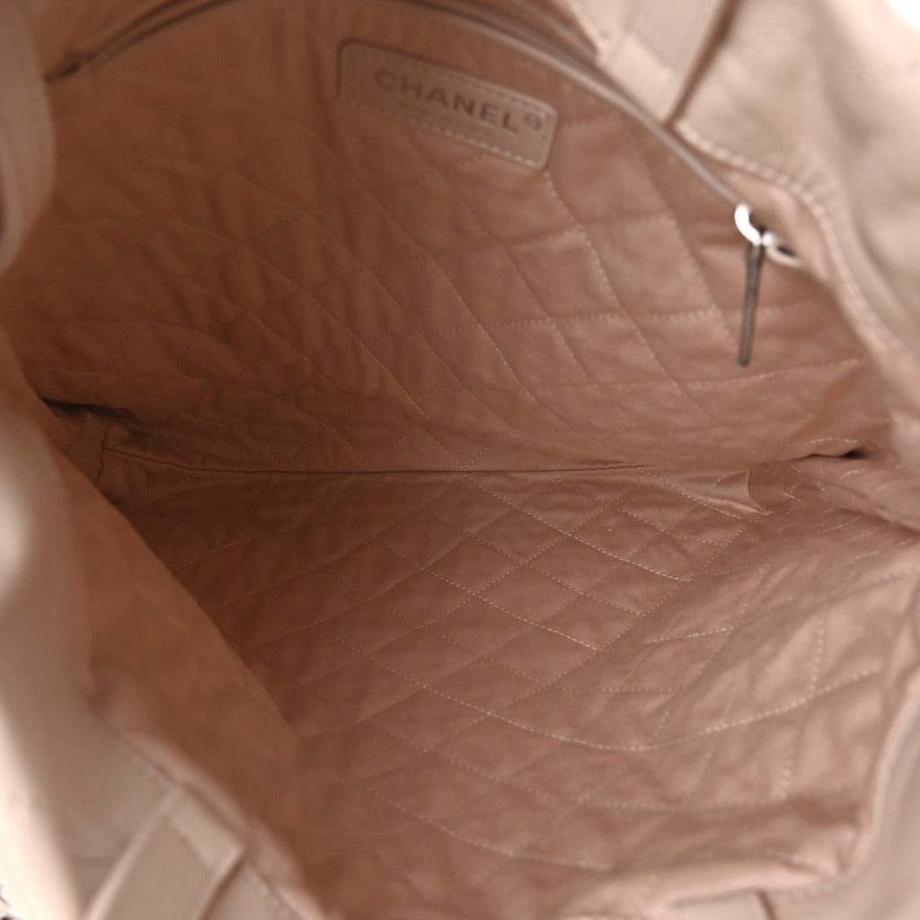 Shiny Calfskin Quilted Chanel 22 Backpack Beige