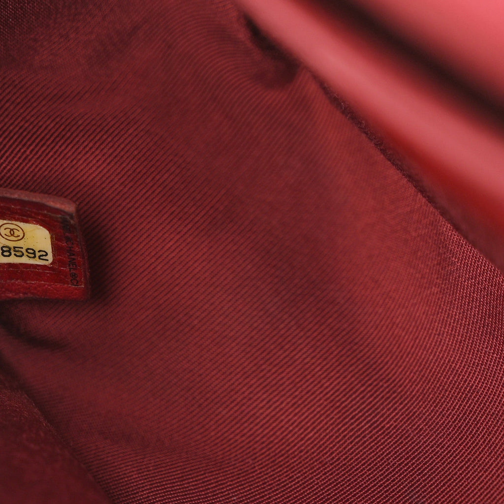 Caviar Quilted Medium Boy Flap Dark Red