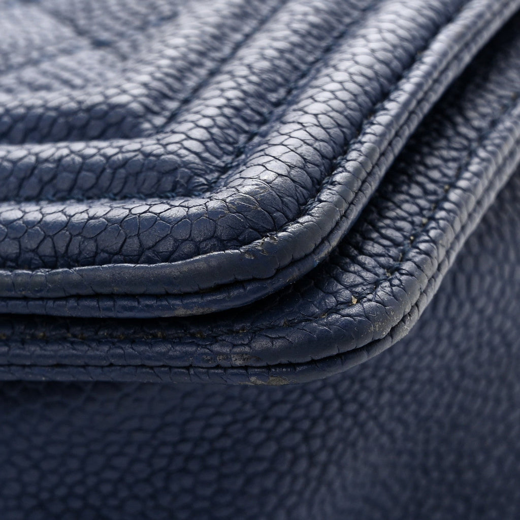 Caviar Quilted Medium Boy Flap Dark Blue