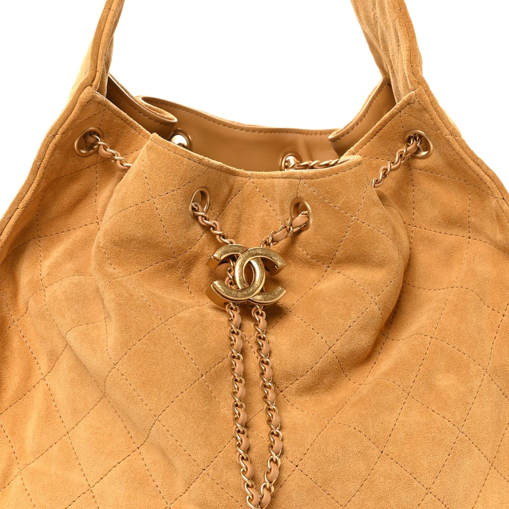 Suede Quilted Medium Chanel 25 Handbag Beige
