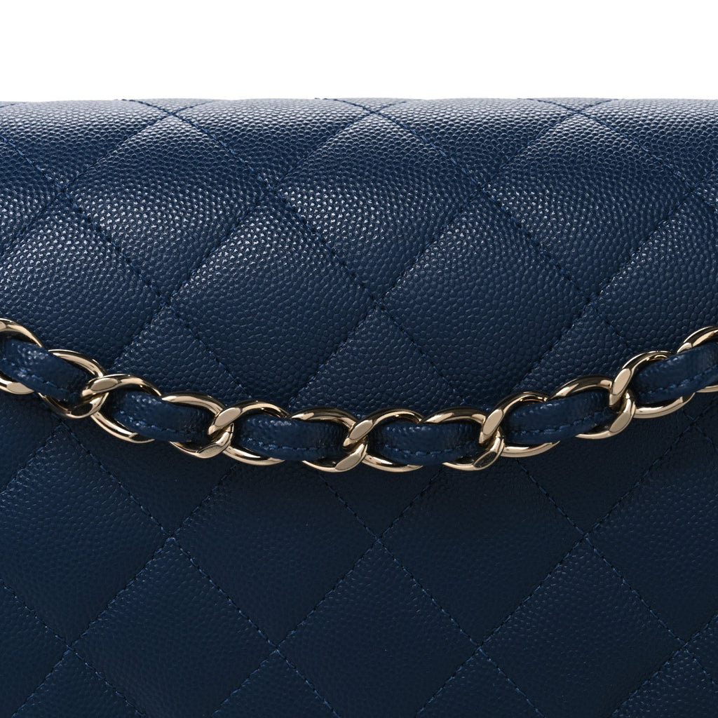 Caviar Quilted Jumbo Double Flap Navy Blue