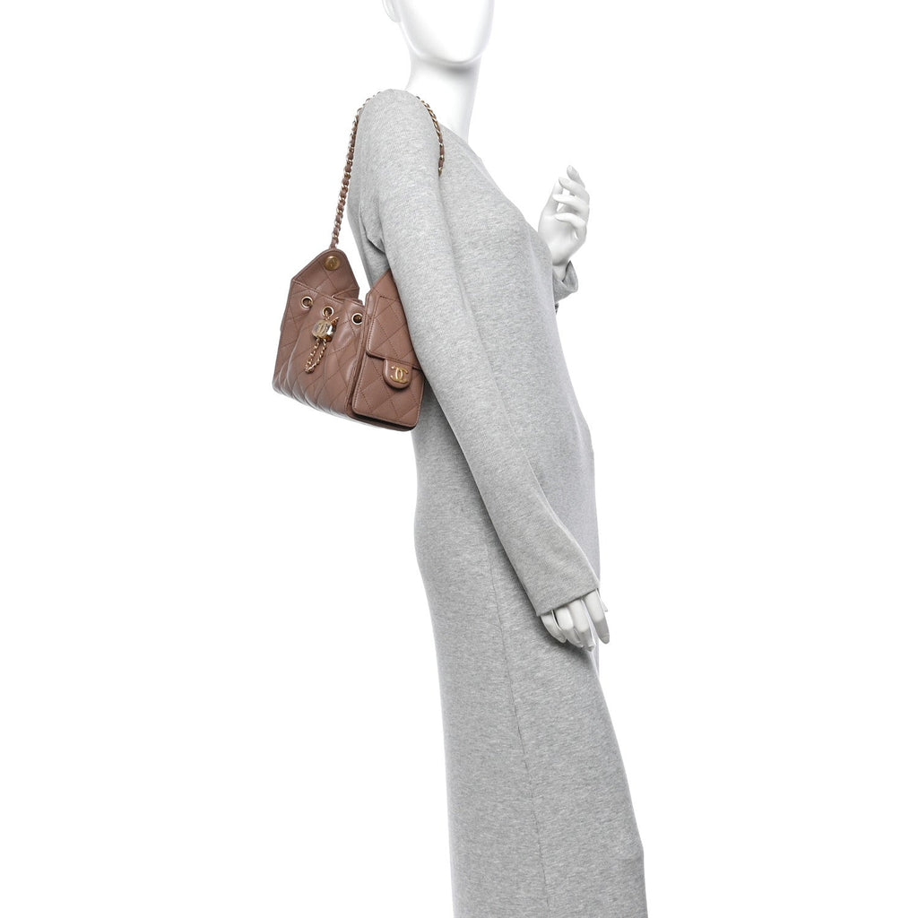 Caviar Quilted Mini Chanel 25 Handbag Brown