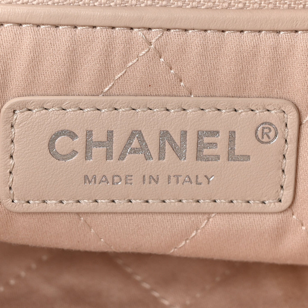 Shiny Calfskin Quilted Chanel 22 Backpack Beige