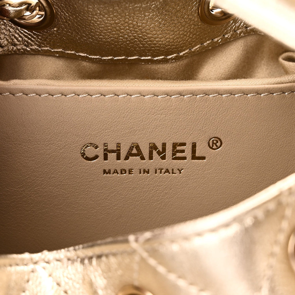 Metallic Caviar Quilted Small Chanel 25 Handbag Gold