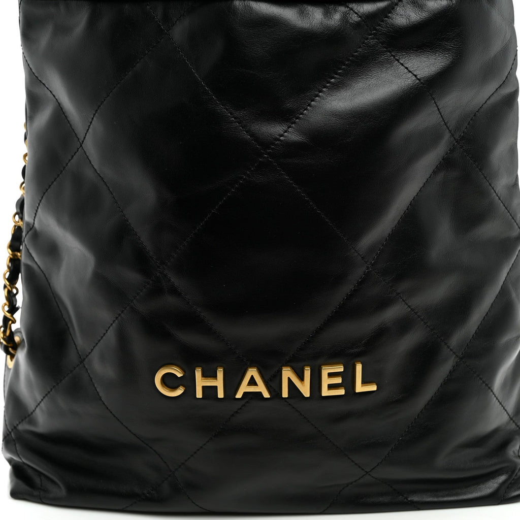 Shiny Calfskin Quilted Chanel 22 Backpack Black