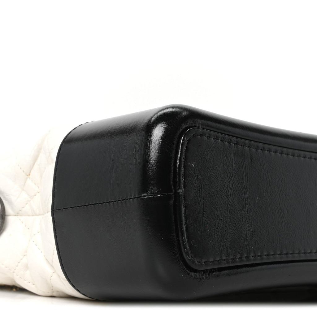 Aged Calfskin Quilted Medium Gabrielle Hobo Black White