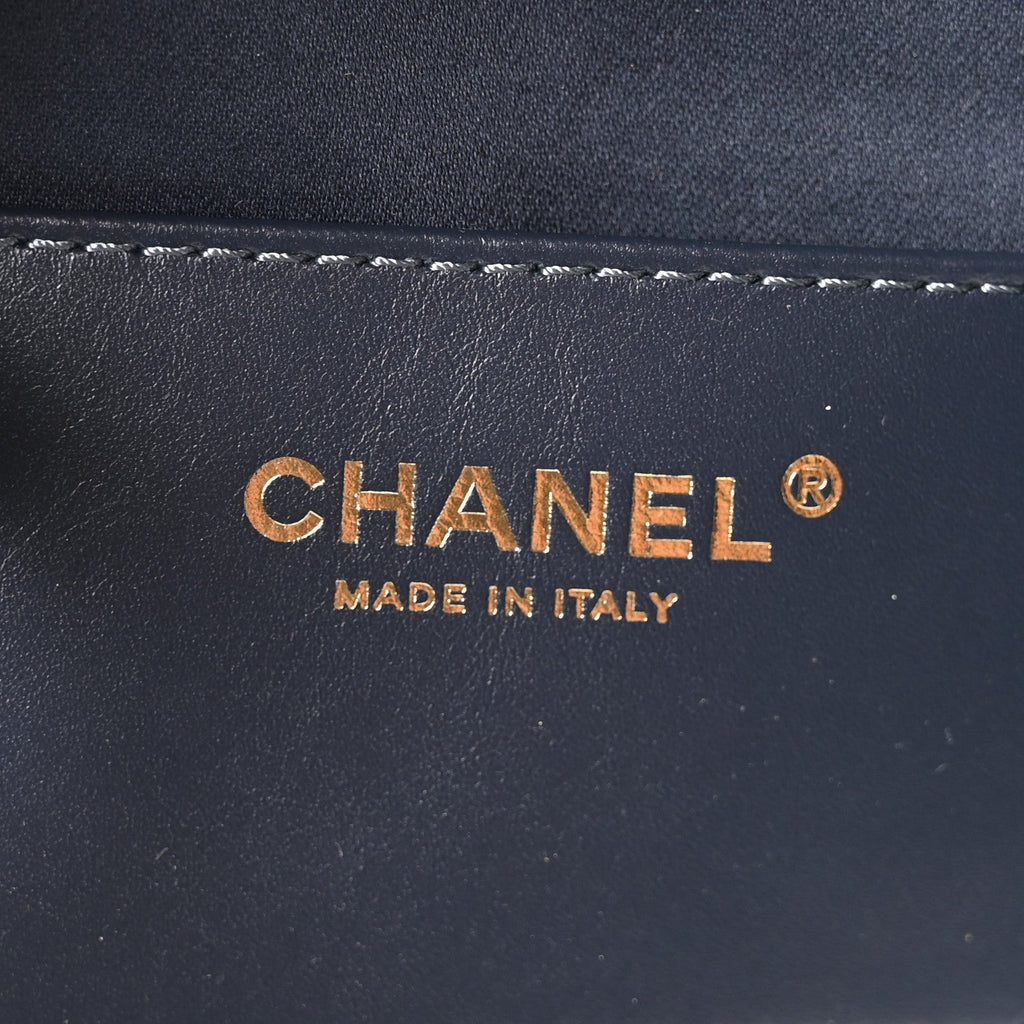 Canvas Quilted Medium Chanel 25 Handbag Dark Blue