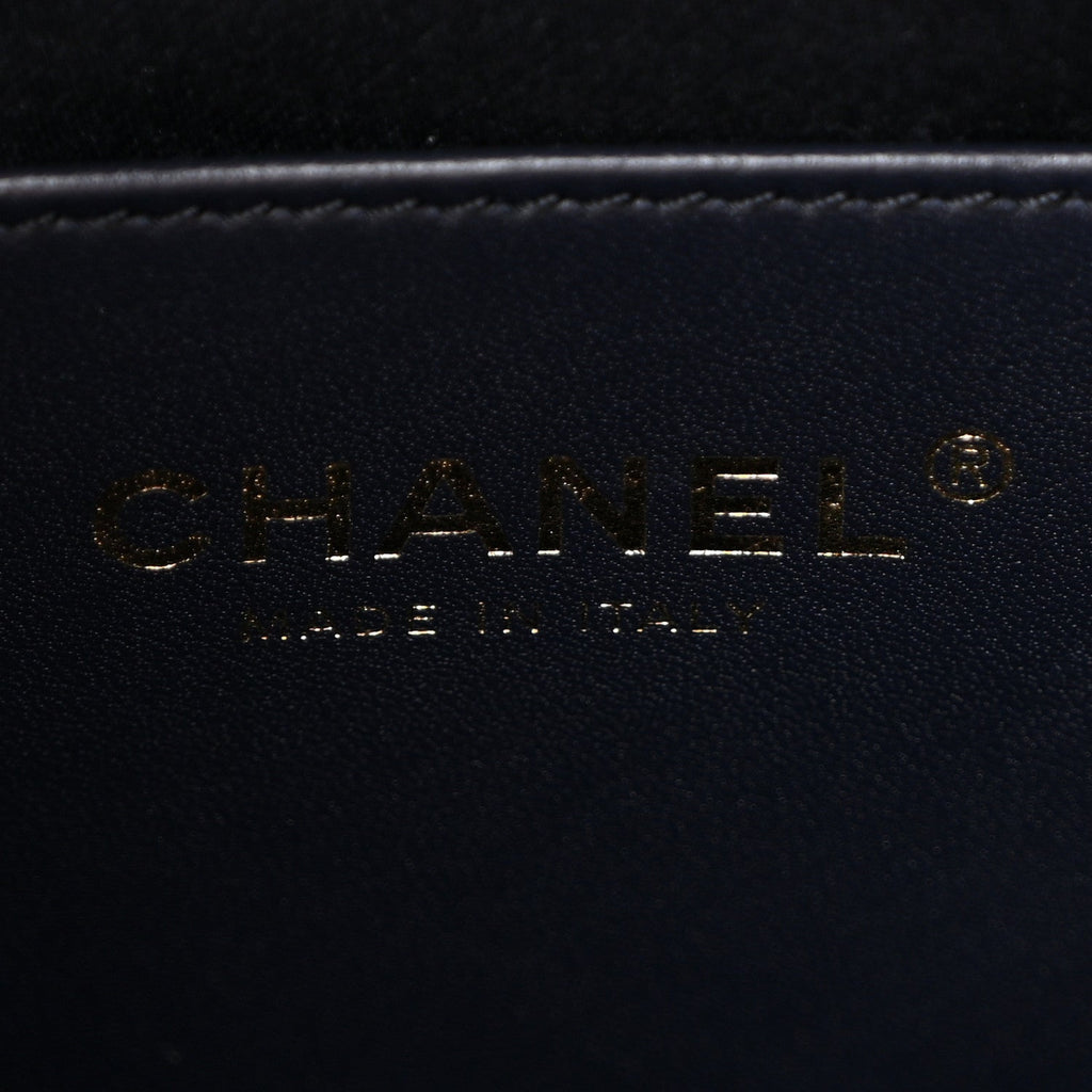Denim Quilted Medium Chanel 25 Handbag Dark Blue