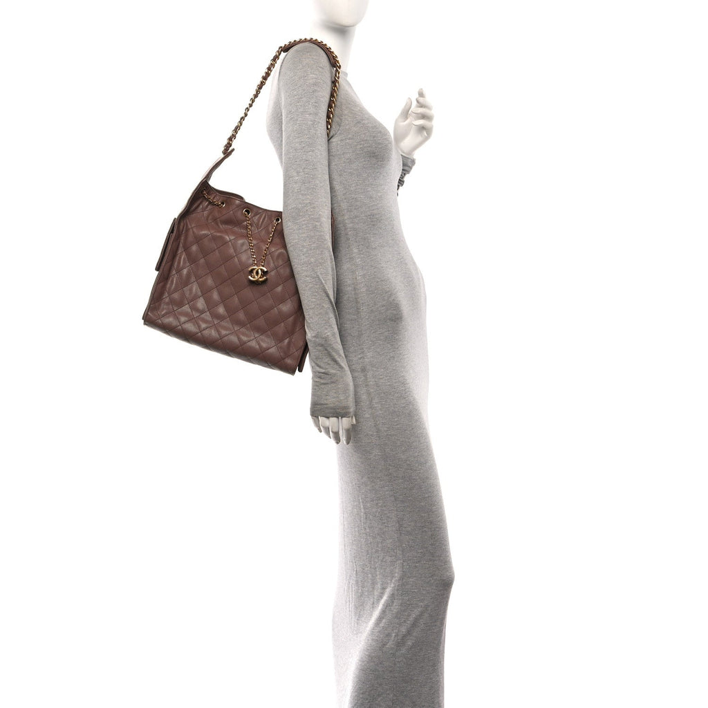 Caviar Quilted Medium Chanel 25 Handbag Brown