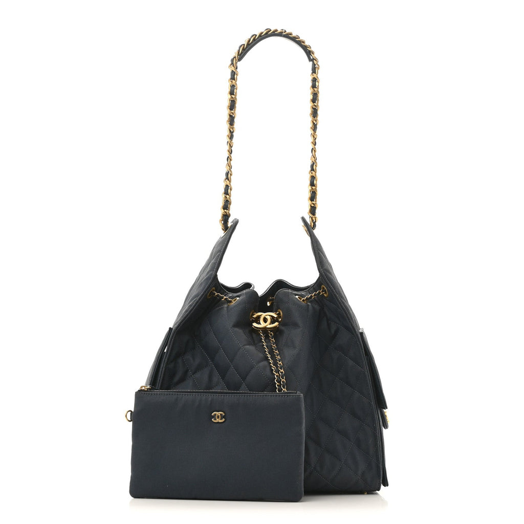 Canvas Quilted Medium Chanel 25 Handbag Dark Blue
